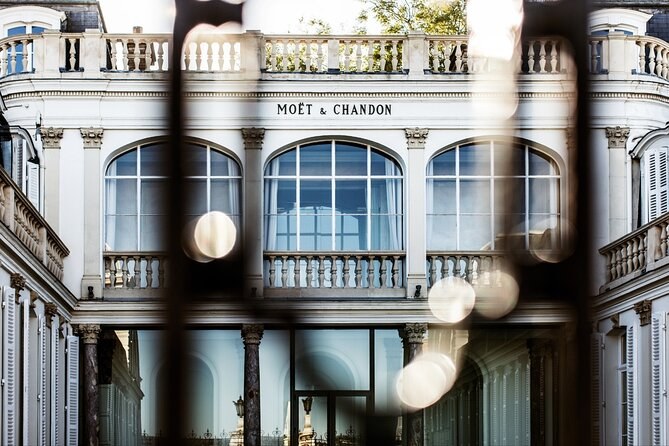 The Moët & Chandon house front, seen through its iron gates