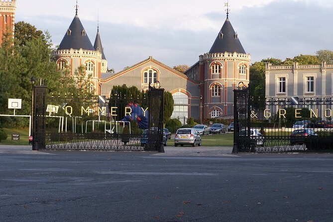 The Pommery estate in Reims, its turreted buildings behind the iron gates